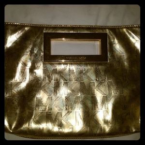 Michael Kors Gold monogram clutch bag